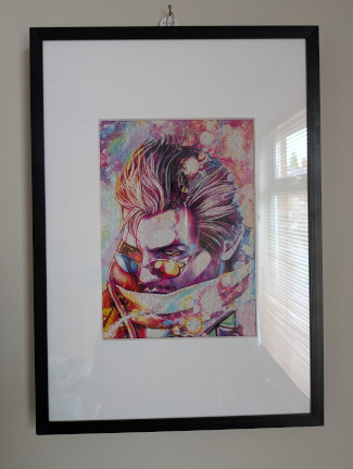 Colourful framed drawing of Auron