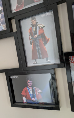 Two framed photos of live-action Auron