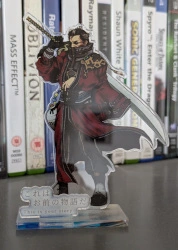 An acrylic stand featuring Auron